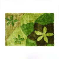 Alfombra verde con diseño floral - AZURRA